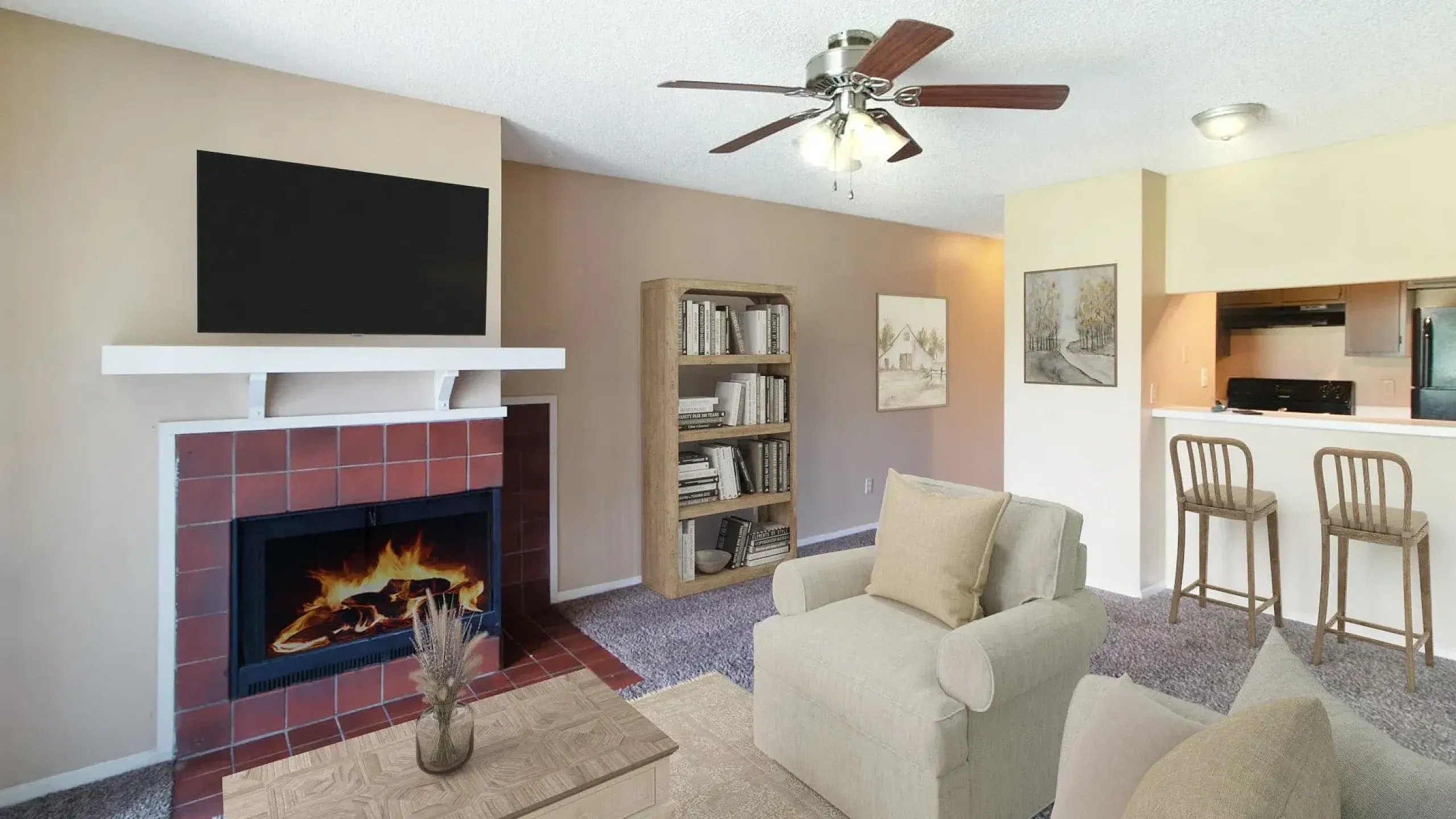 apartment living area with fireplace