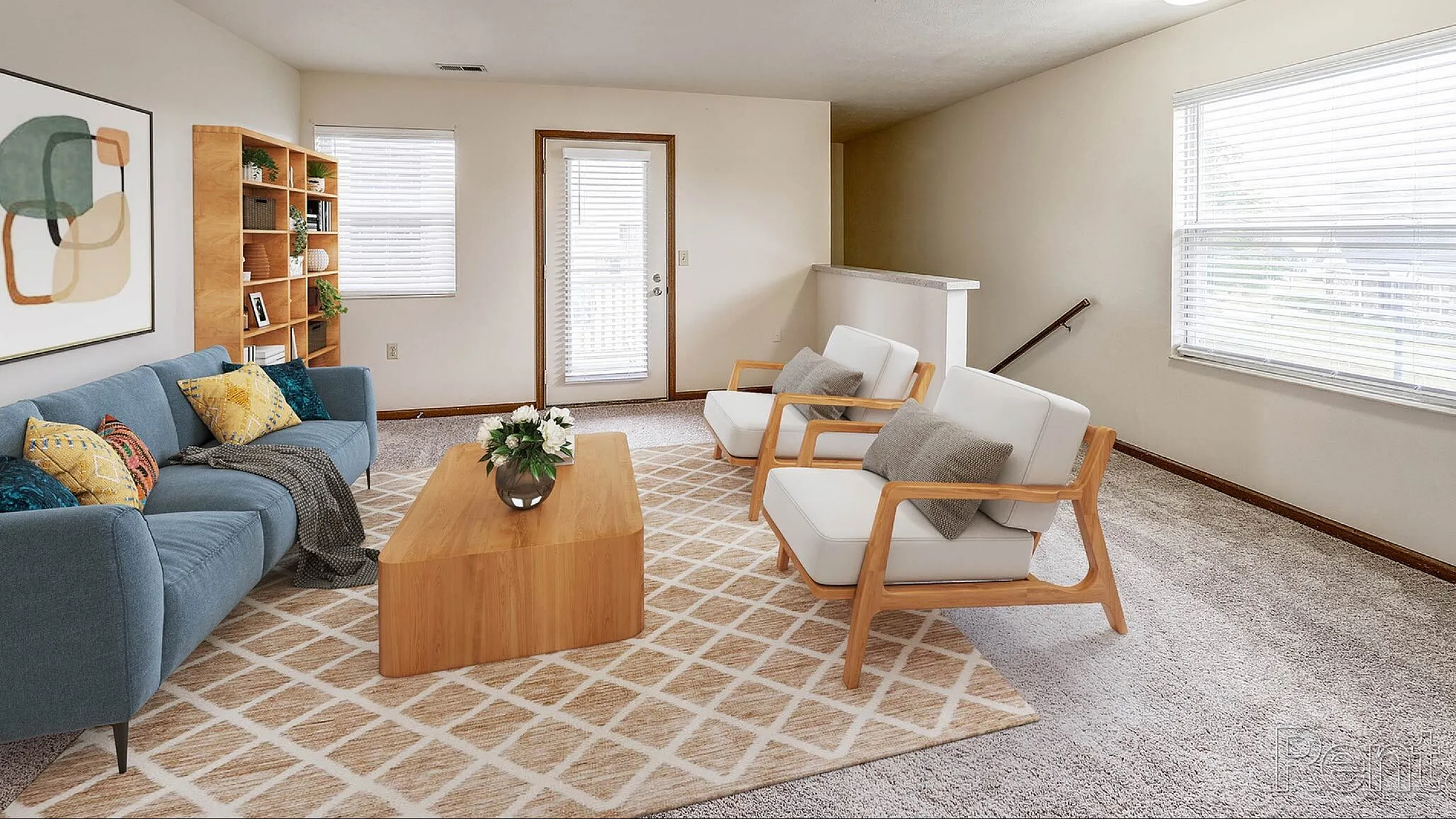 Inviting living room showcasing modern decor, a cozy blue sofa with colorful cushions, elegant wooden furniture, and abundant natural light.