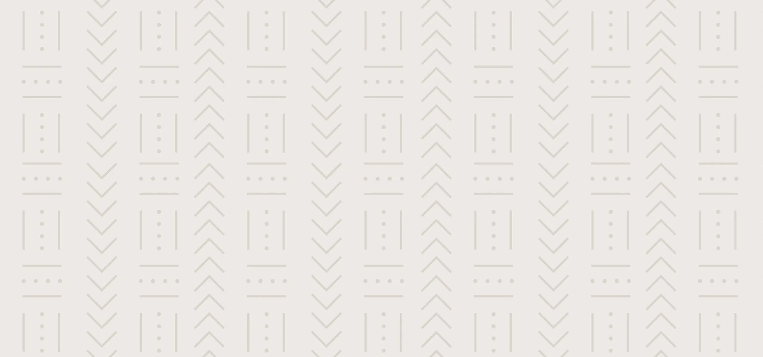 Elegant wallpaper featuring a modern geometric pattern with subtle chevrons and dots, perfect for a sophisticated interior design.