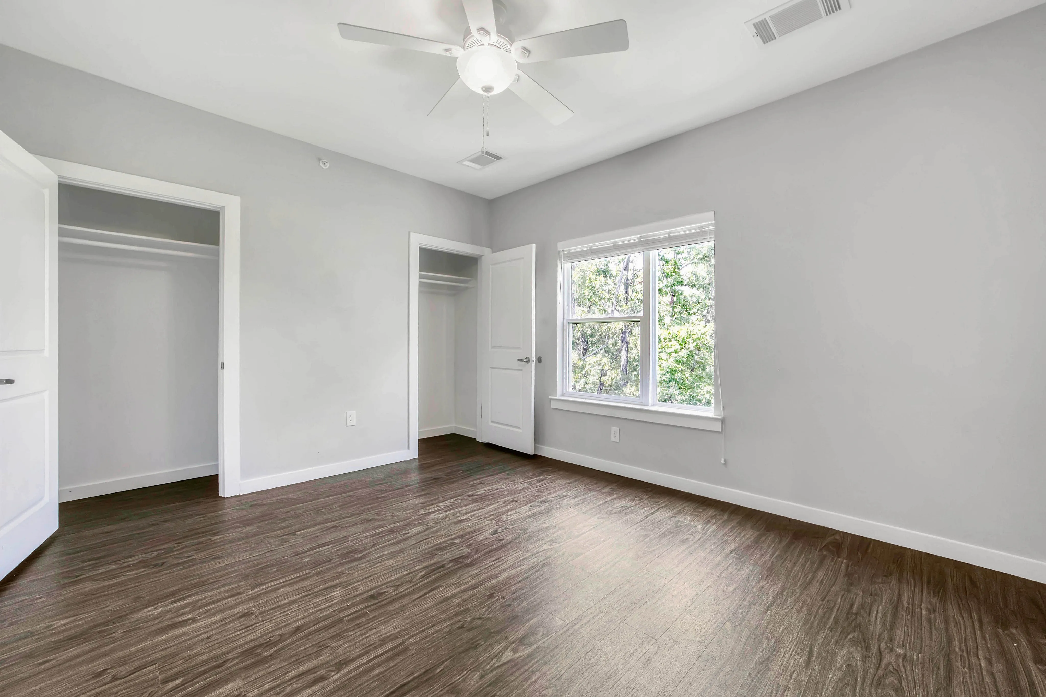 bright open nook room with closets