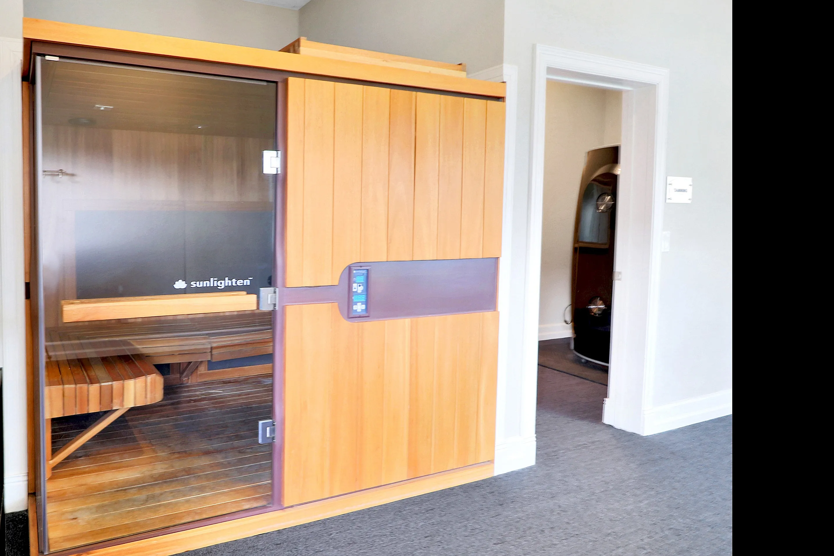 Luxurious in-home sauna with elegant wooden design, perfect for relaxation and rejuvenation.
