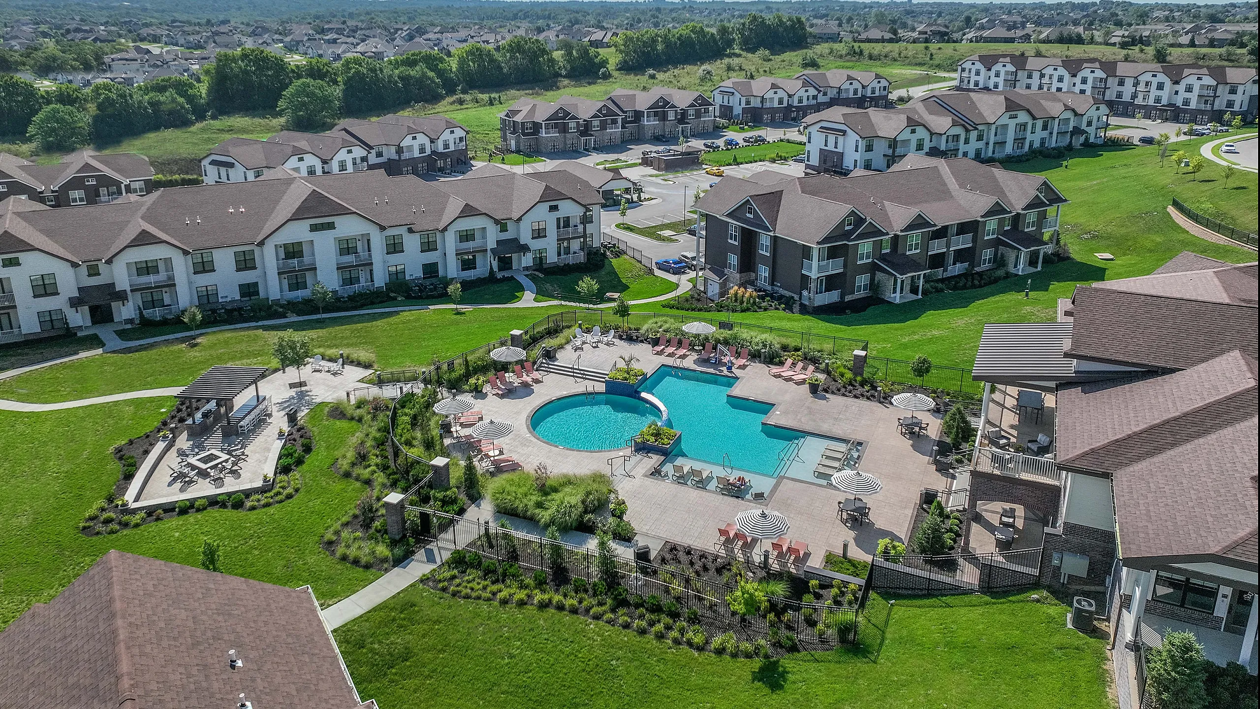 Meridan at View High apartments aerial photo pool with apartment buildings in background
