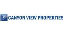 Canyon View Properties logo with a stylized blue canyon design, symbolizing modern and scenic real estate offerings.