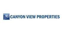 Canyon View Properties logo in bold blue font with a stylized mountain graphic, symbolizing quality real estate.