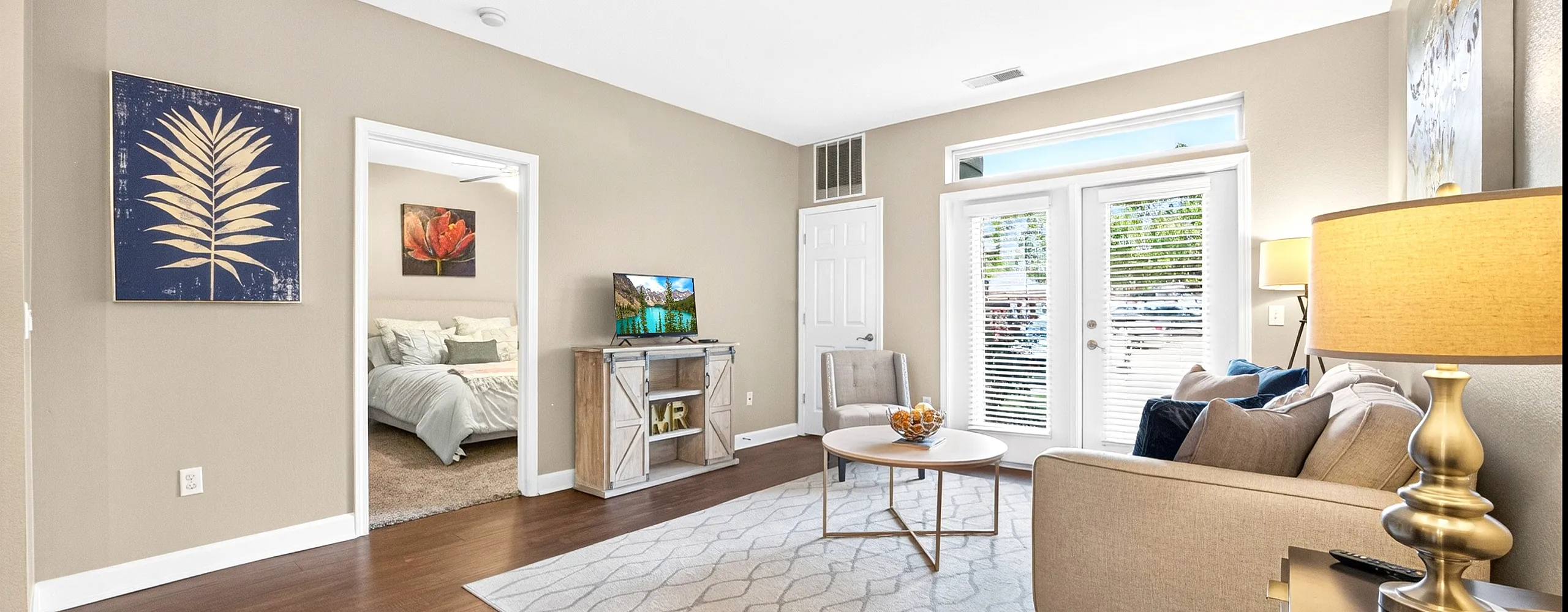 Bright and inviting living room with elegant decor, plush seating, and abundant natural light, perfect for relaxing and entertaining.