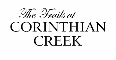 Elegant logo of The Trails at Corinthian Creek, showcasing sophisticated black script and serif typography.
