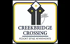 Elegant Creekbridge Crossing logo highlighting resort-style apartments with modern design and palm tree silhouette.