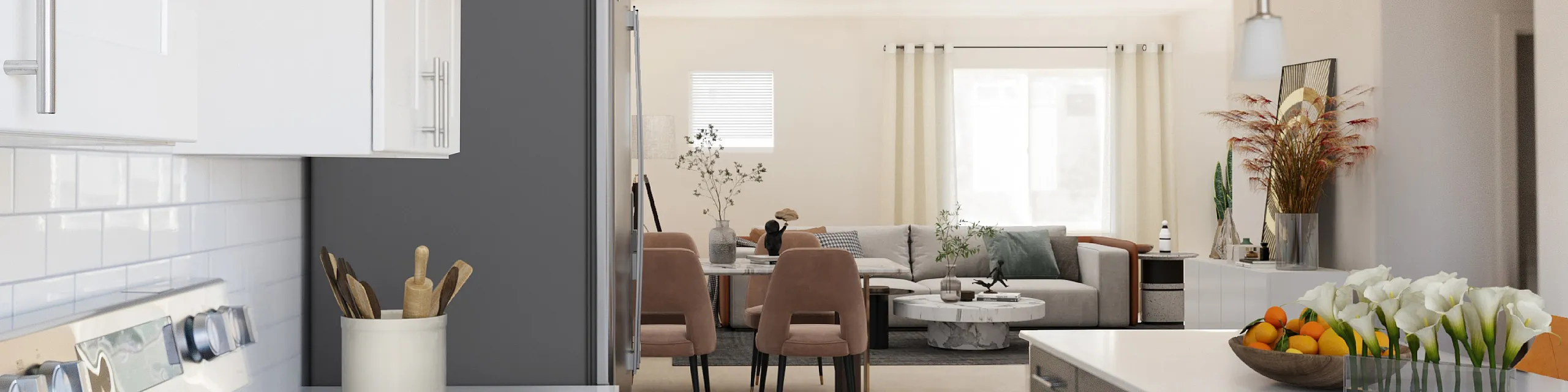 Modern open-concept kitchen with sleek white cabinetry leading into a stylish living room, highlighted by elegant decor and natural light.