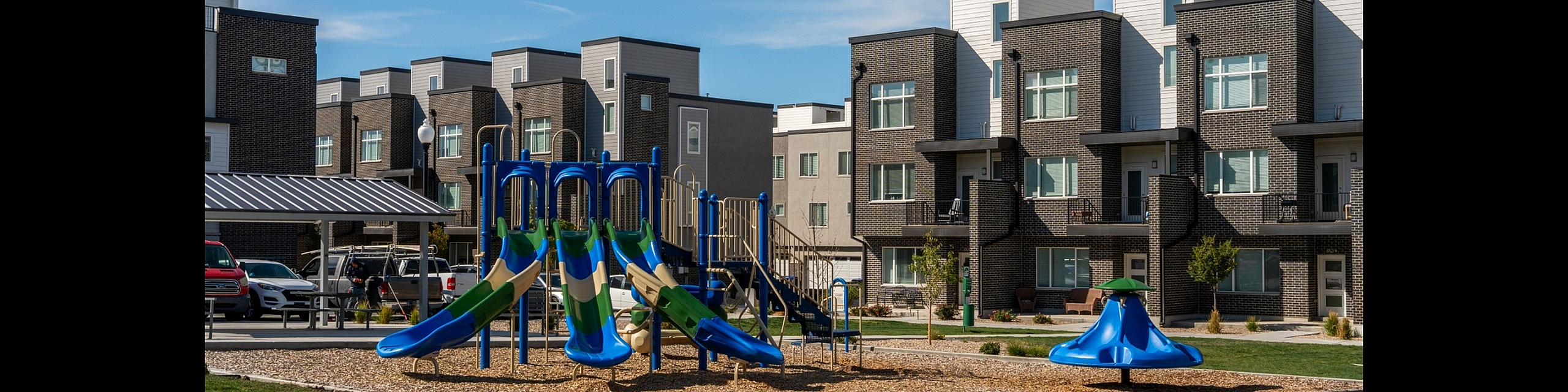 Townhomes and playground at Erin Hills Estates in West Valley City