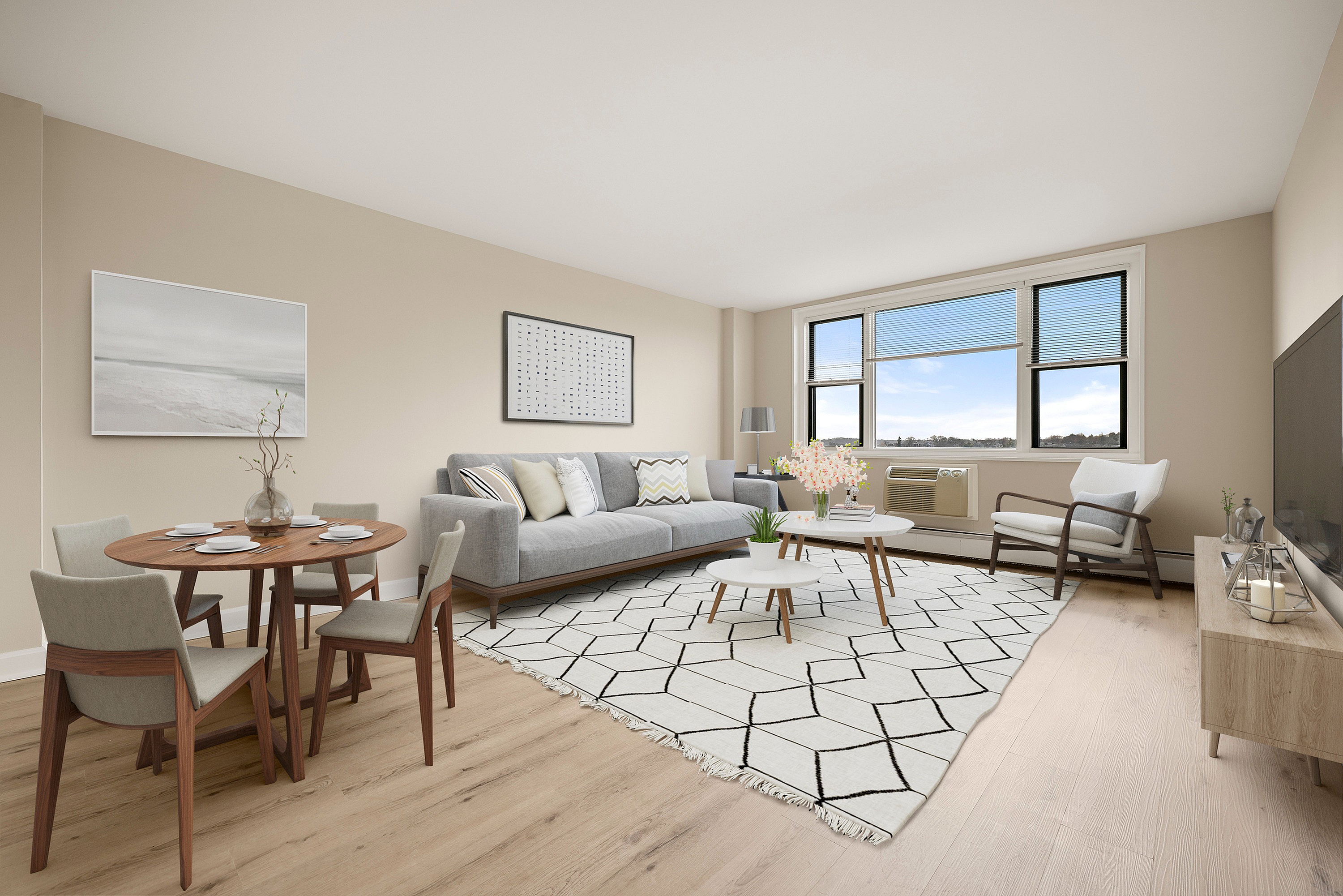Bright, open-concept living room with sleek modern decor, featuring cozy seating, stylish dining area, and large windows for natural light.