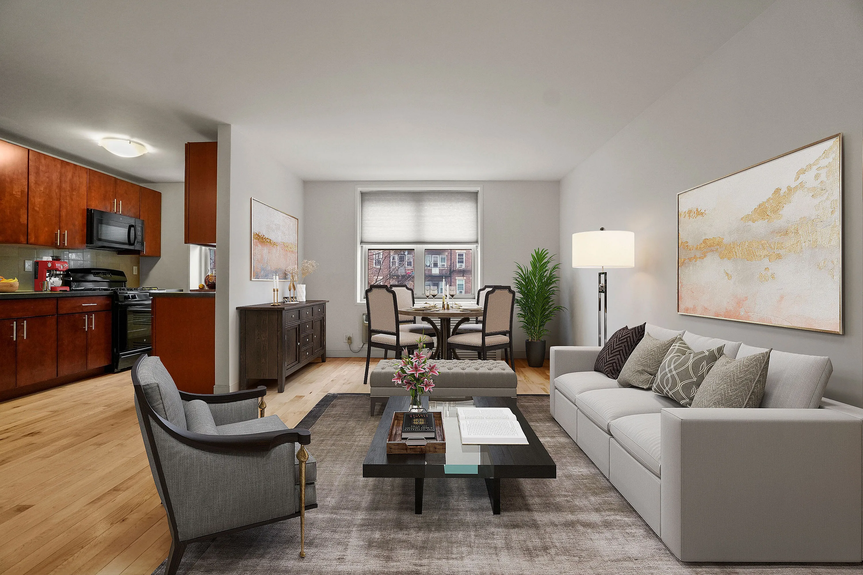Elegant apartment living area with modern kitchen, cozy dining space, and stylishly furnished living room featuring chic artwork, lush plant, and abundant natural light.