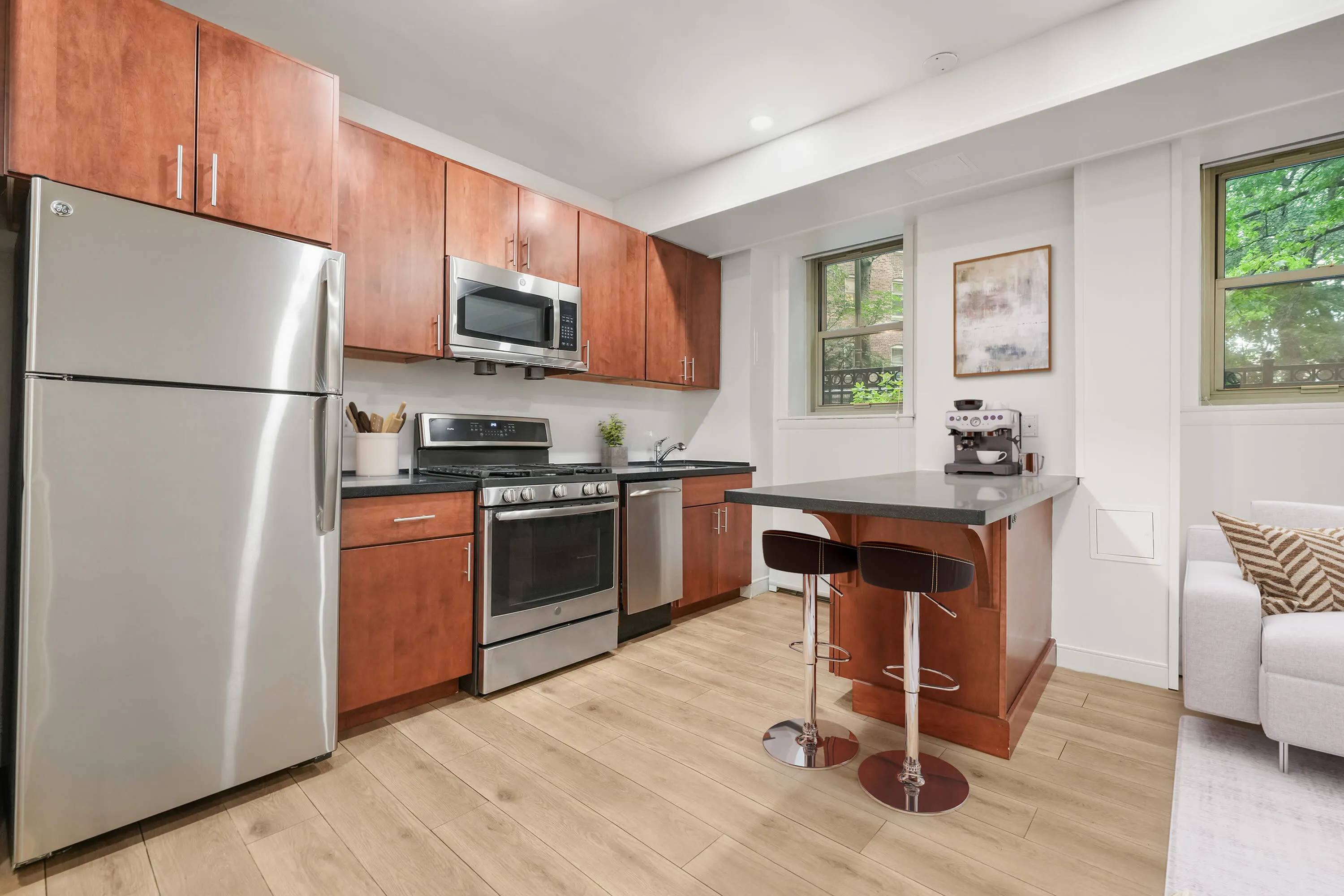 open kitchen with stainless steel appliances