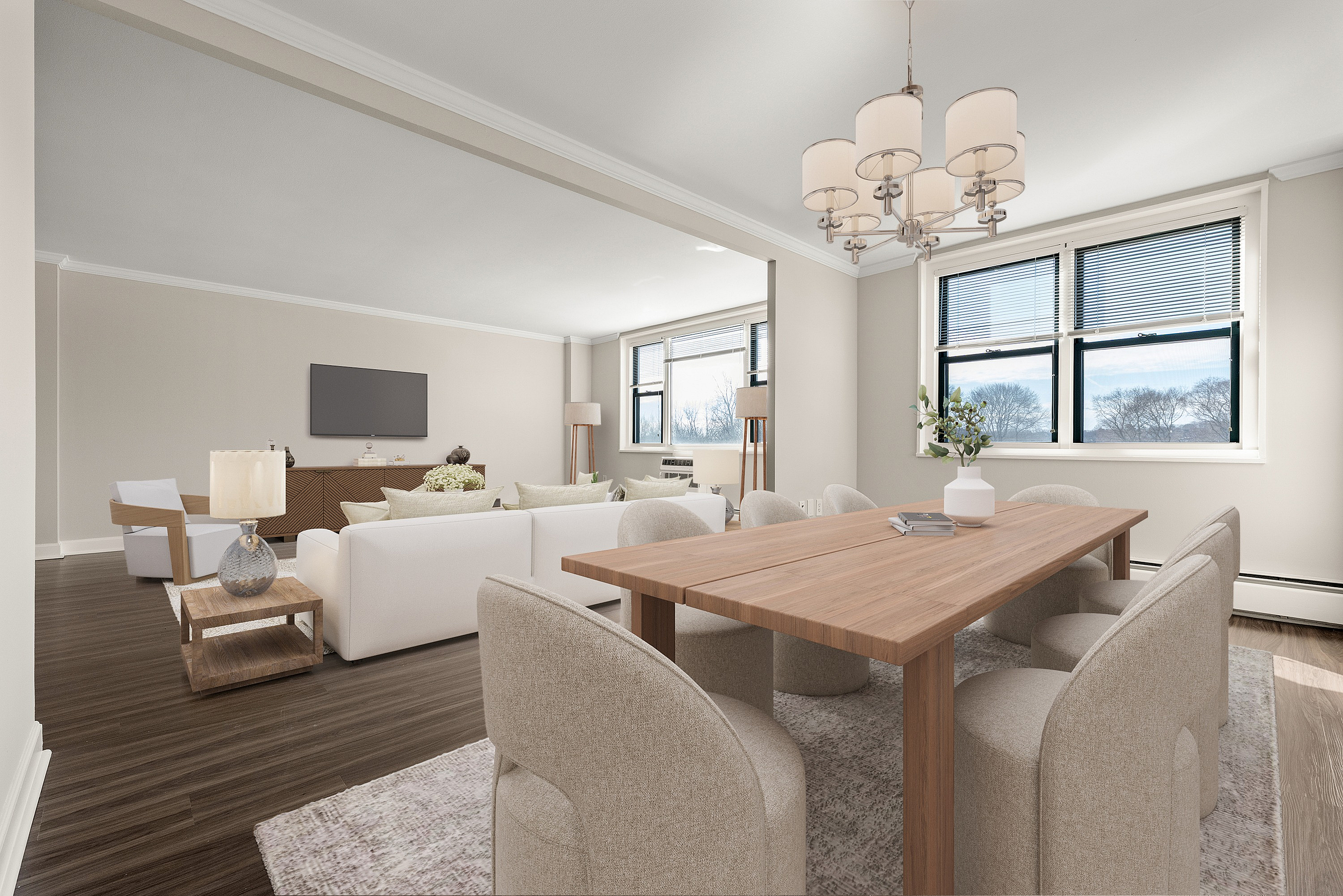 Elegant apartment living room with a modern dining area, featuring stylish lighting, large windows, and chic decor.