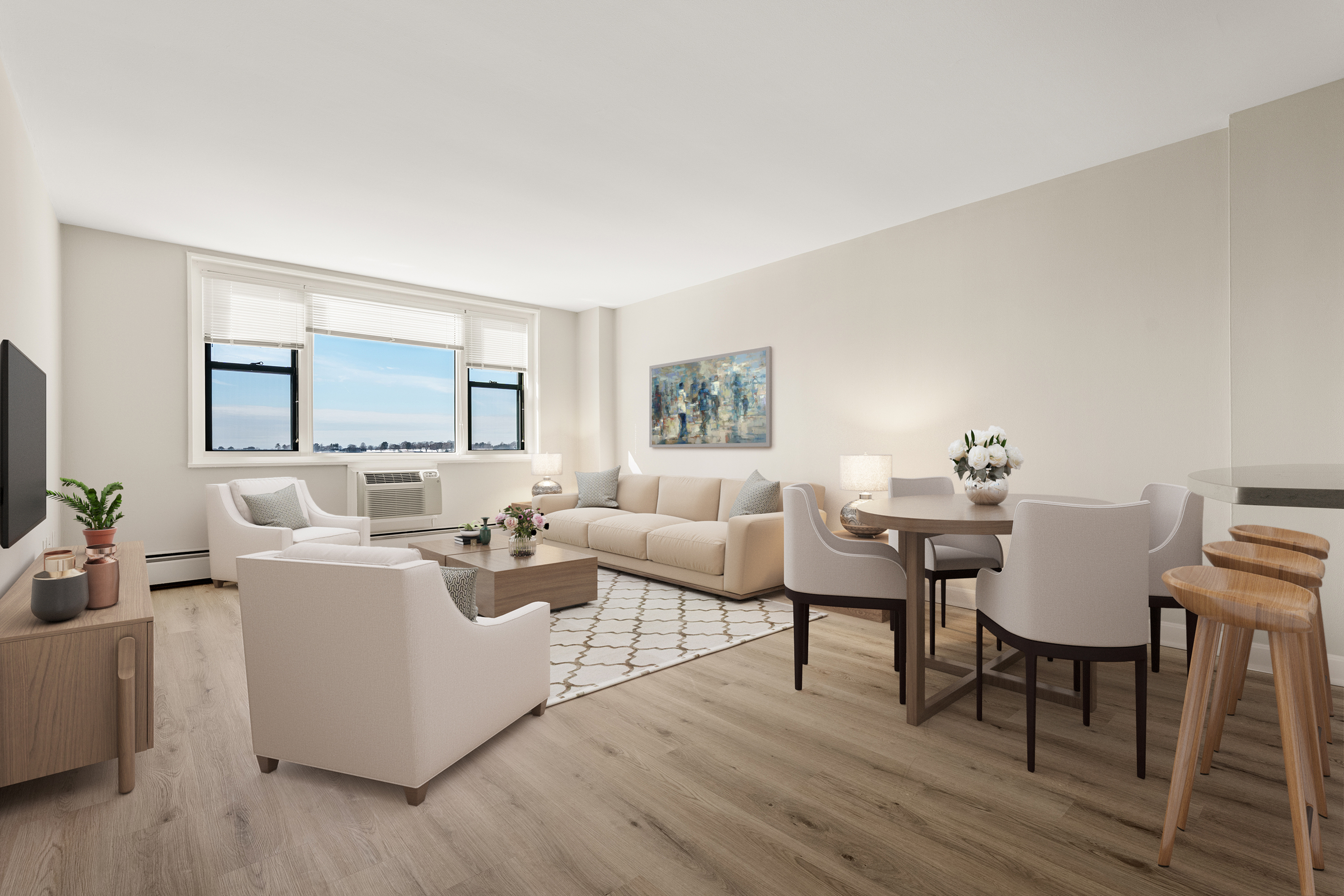 Inviting open-concept living area with elegant decor, featuring a modern kitchen, stylish dining set, and cozy seating for relaxation.