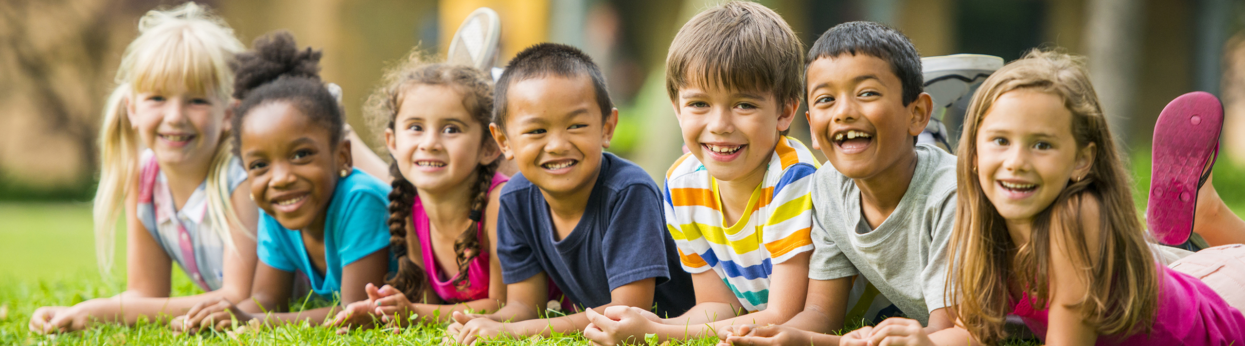 kids outside smiling