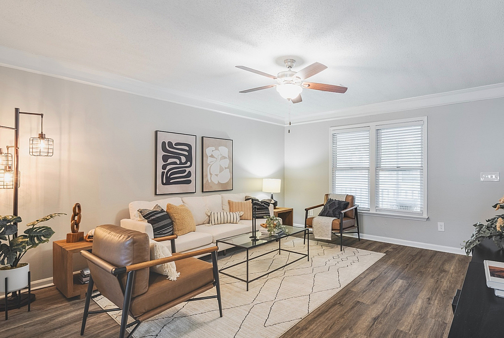 Inviting living room featuring elegant decor, warm lighting, and modern furnishings, perfect for relaxation and entertainment.