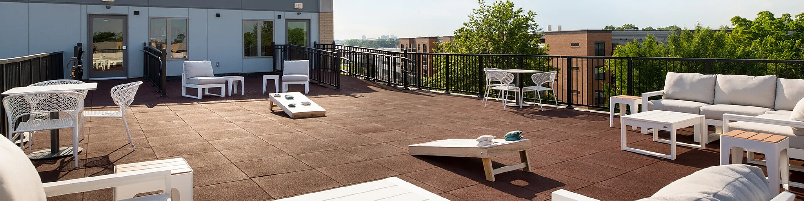 Inviting rooftop patio offering stunning views, stylish seating, and perfect for outdoor gatherings.