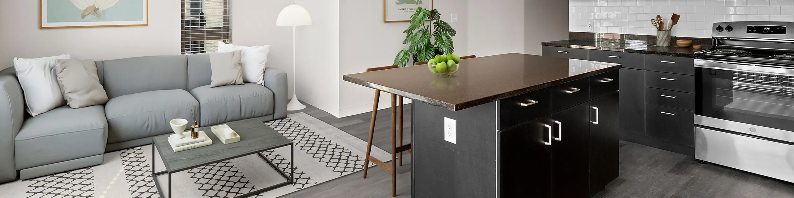 Modern open-plan apartment with sleek kitchen, cozy living area, and elegant minimalist decor, perfect for stylish urban living.