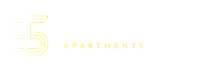 Modern logo for Tracks at Seymour Apartments, featuring sleek typography and a stylish design.