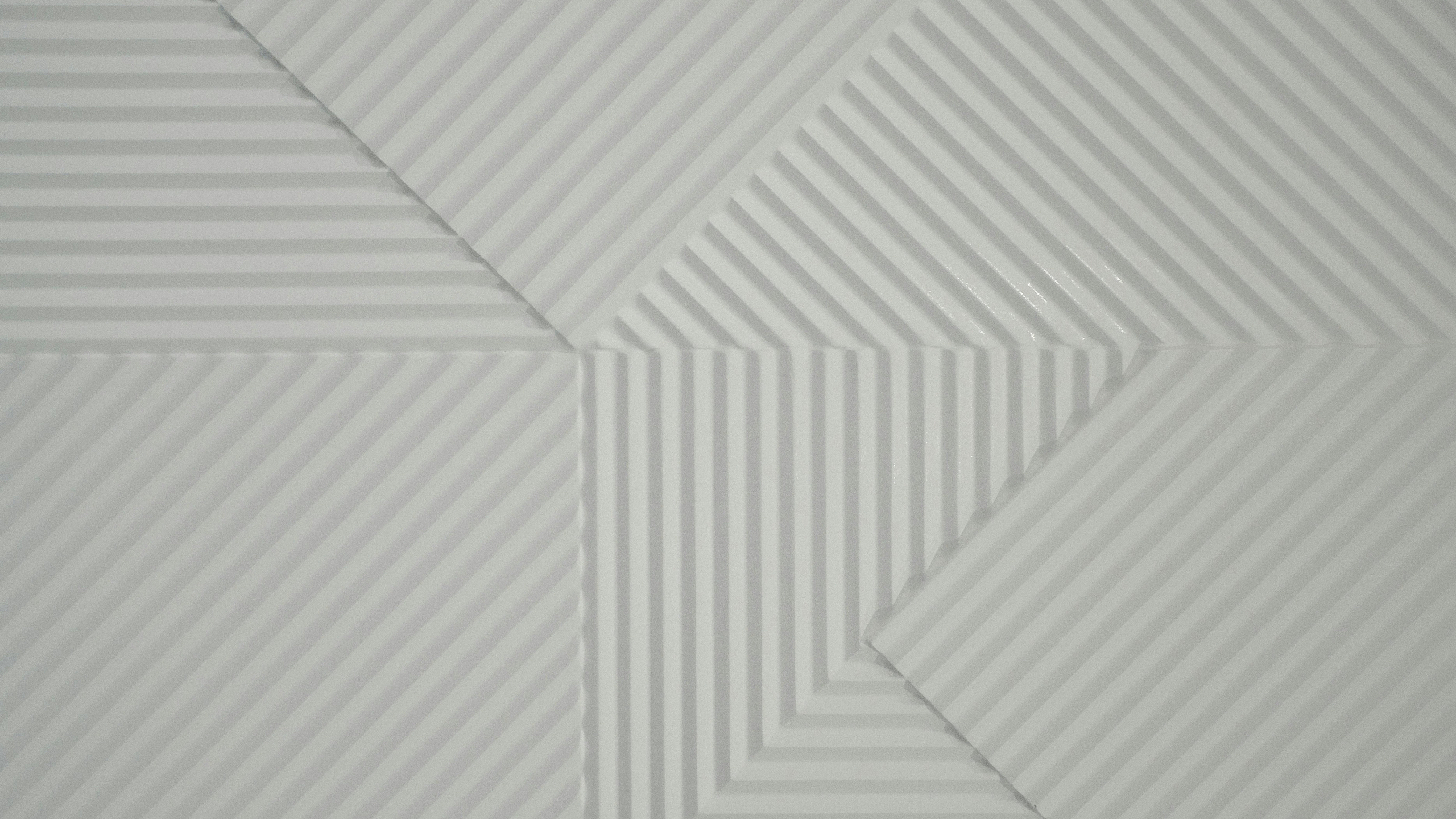 Modern decorative wall panel with geometric patterns and textured stripes, perfect for contemporary interiors.