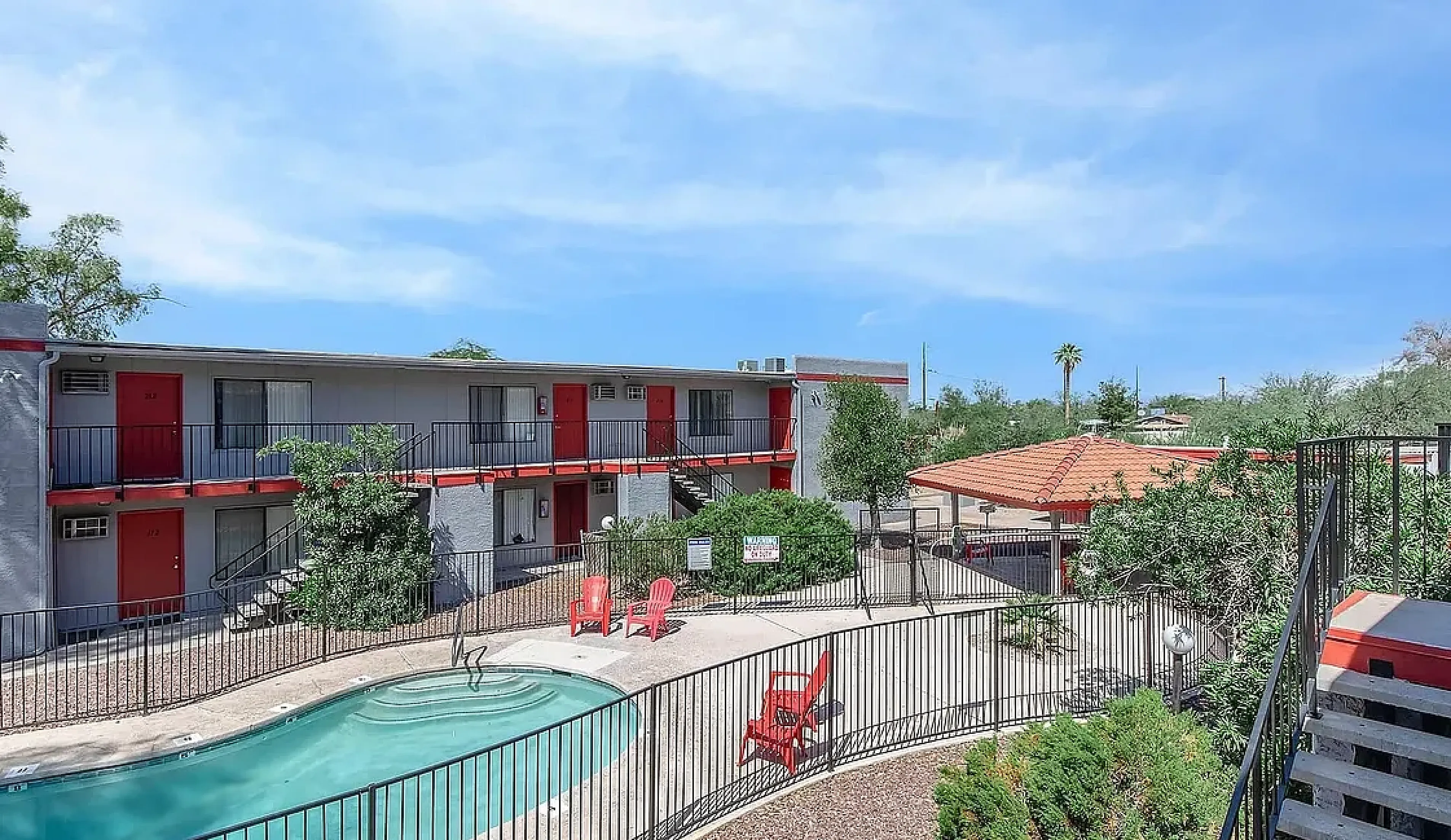 Outdoor swimming pool beside a residential property building in Prince Plaza