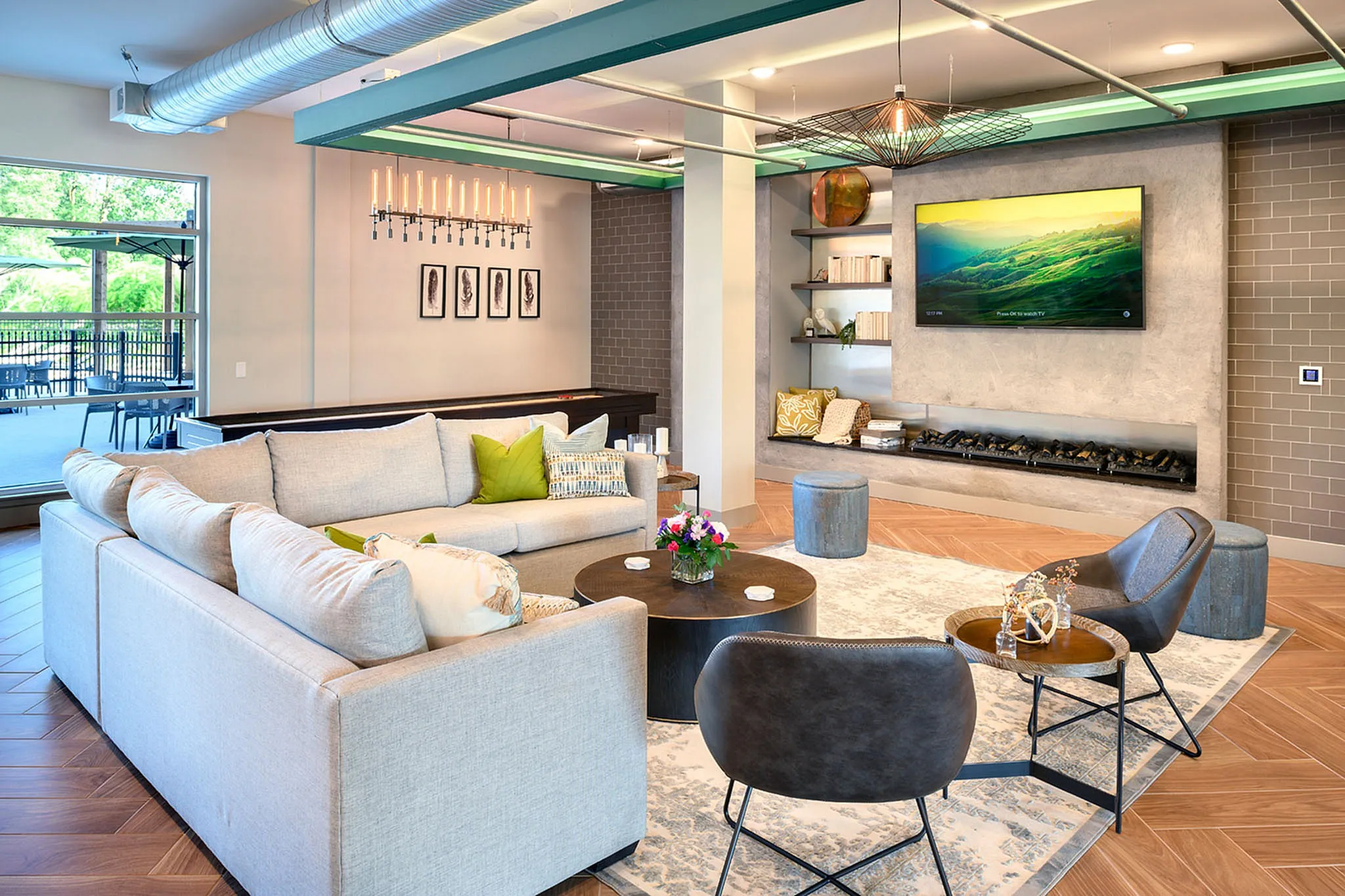 Chic living room with modern decor, featuring a cozy sectional sofa, elegant coffee table, and stylish wall art under ambient lighting.