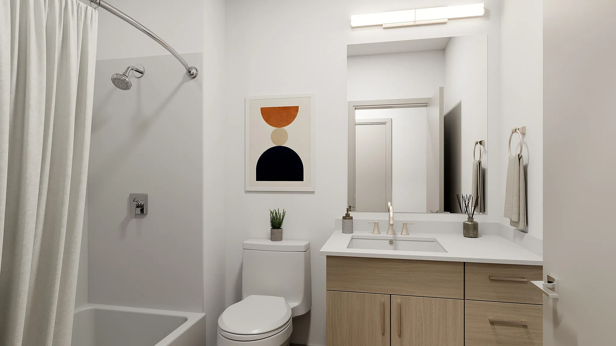 Modern, elegantly designed bathroom with sleek fixtures, a minimalist vanity, and tasteful wall art adding a touch of sophistication.