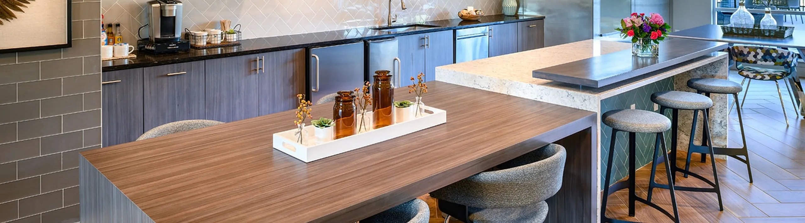 Contemporary kitchen with sleek cabinetry, chic pendant lighting, and a spacious island perfect for entertaining.