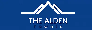 Elegant logo of The Alden Townes featuring stylized mountain peaks on a deep blue background.