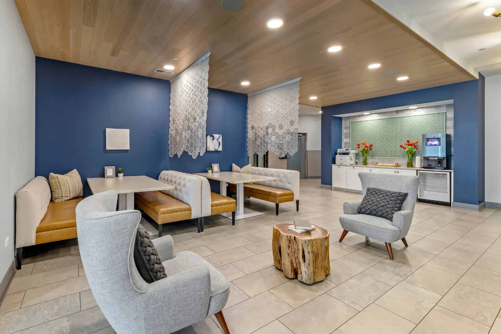 Chic and inviting communal lounge with cozy seating and stylish decor, perfect for relaxation and socializing.