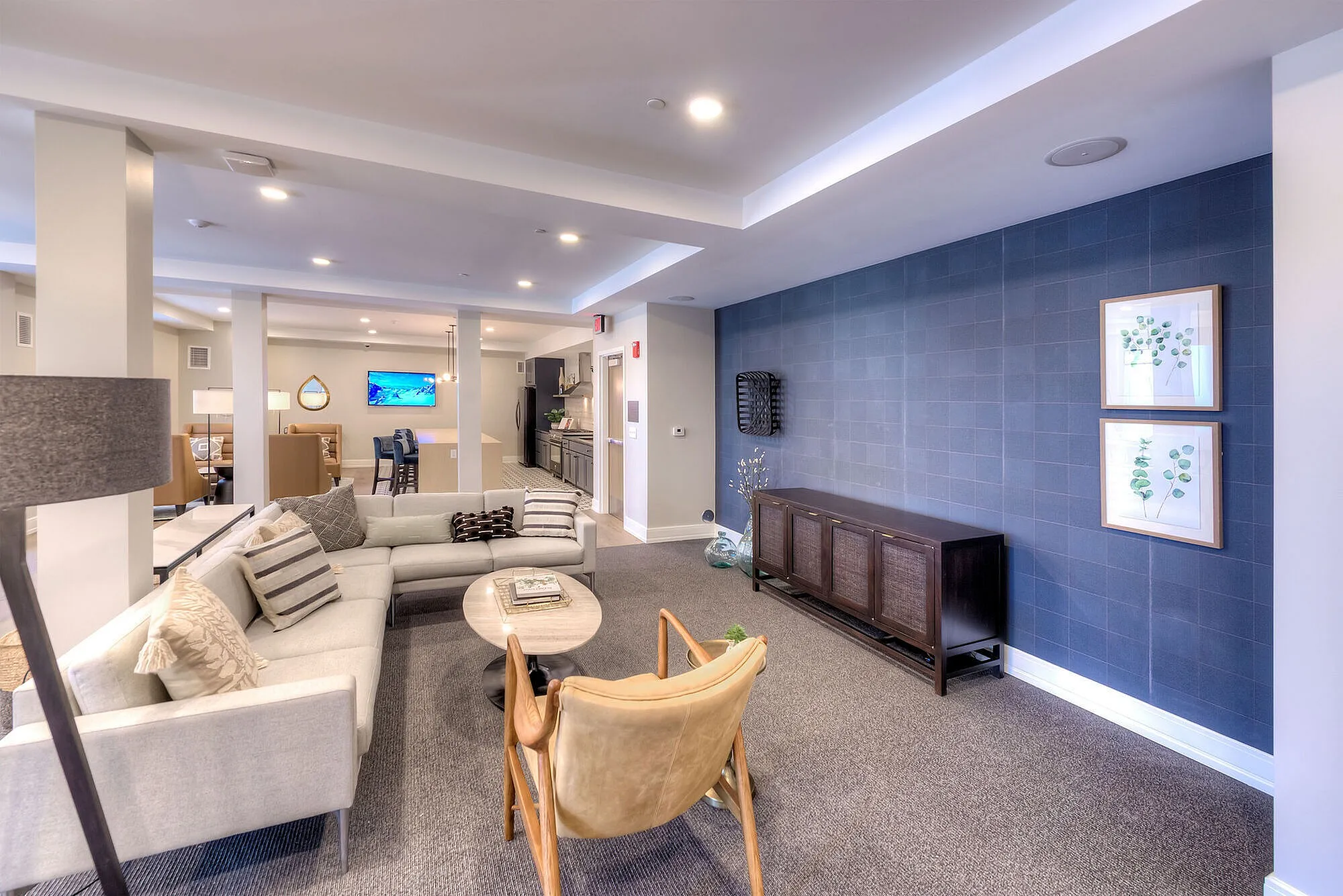 Elegant and spacious living area featuring contemporary décor, plush seating, and an open-concept design perfect for relaxation and entertainment.