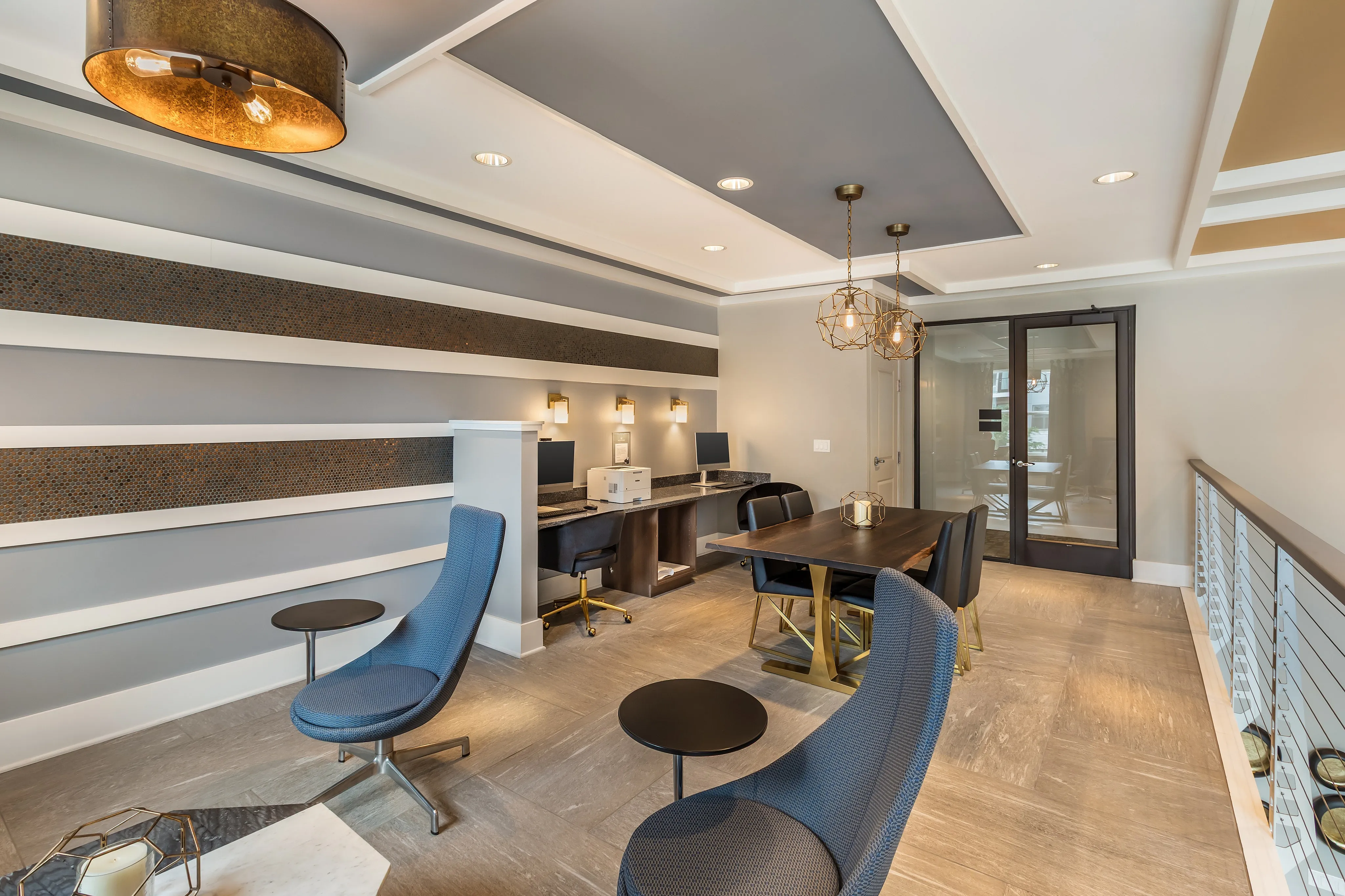 Contemporary office space with chic decor, featuring modern workstations and elegant seating in a stylish open layout.