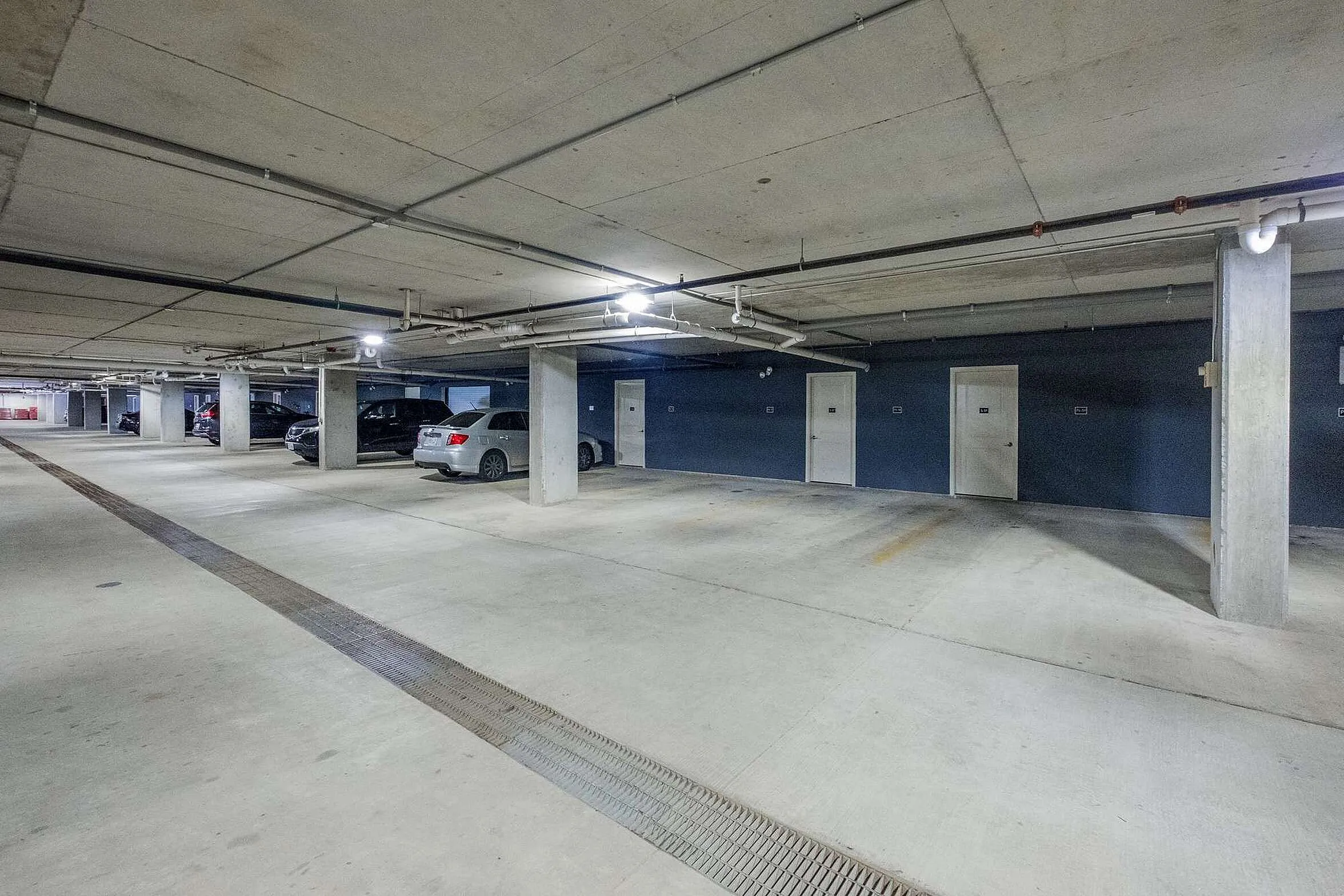 Secure and spacious underground parking facility with ample parking spaces and easy access.