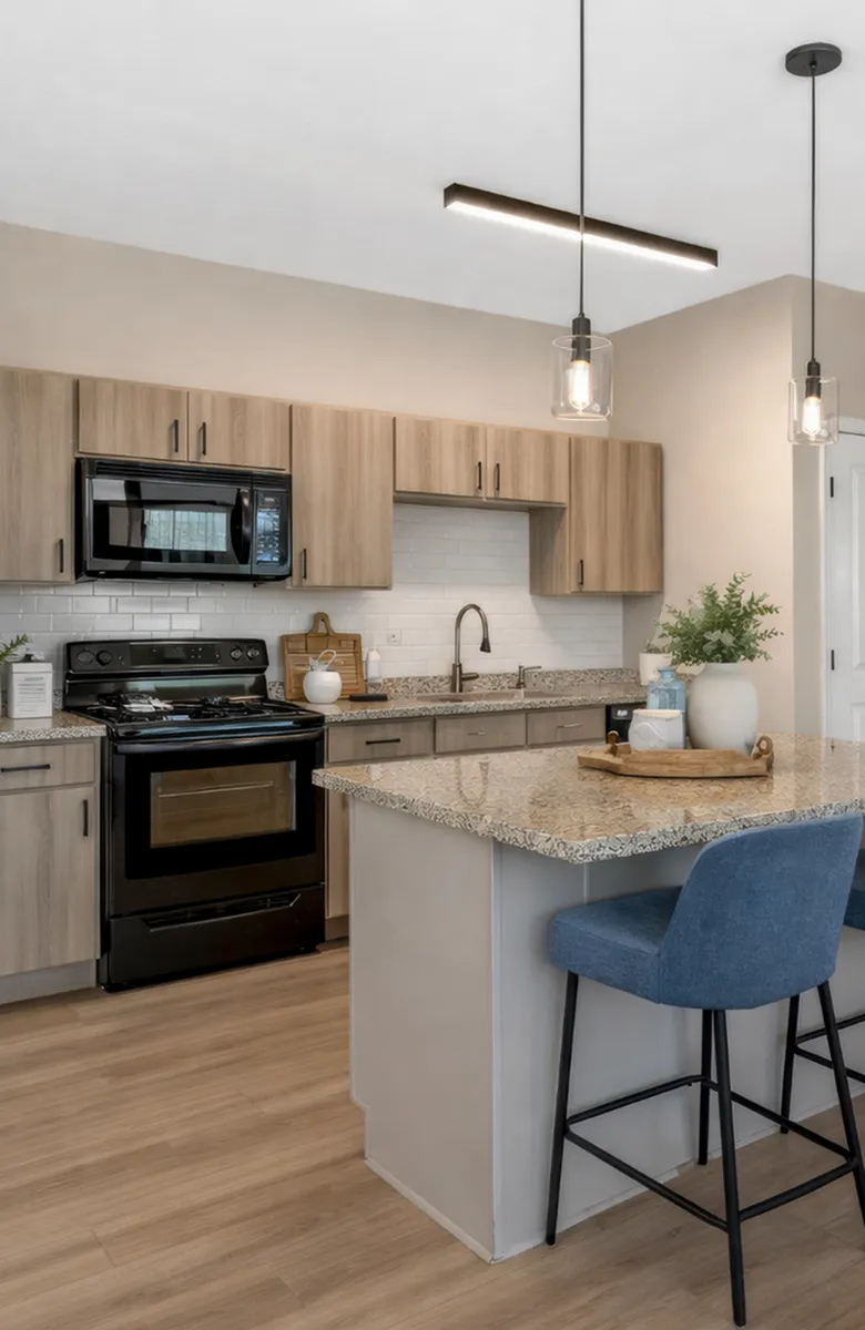 Modern kitchen with sleek wooden cabinets, granite countertops, and stylish pendant lighting, offering a chic and inviting cooking space.