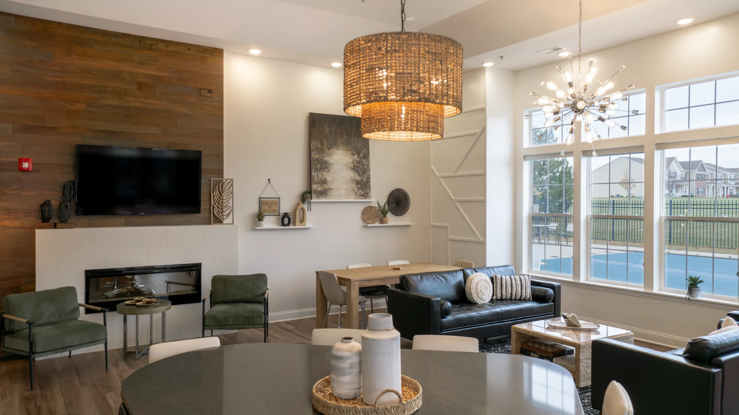 Inviting apartment complex with luxurious poolside loungers, pristine swimming pool and picturesque community setting.