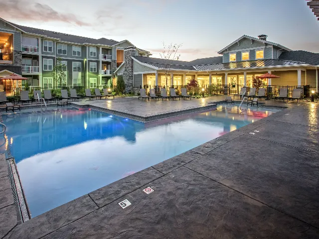 Pool with clubhouse in background.