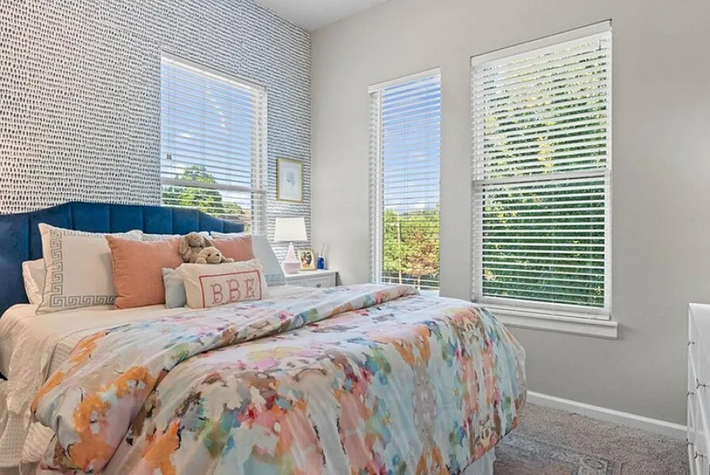 Modern bedroom with natural lighting.