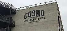 Exterior view of Cosmo Lofts showcasing a modern design with an accessible outdoor stairway.