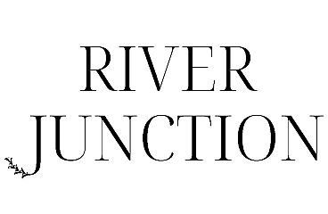 Elegant typography design featuring 'River Junction' with a stylish floral accent.