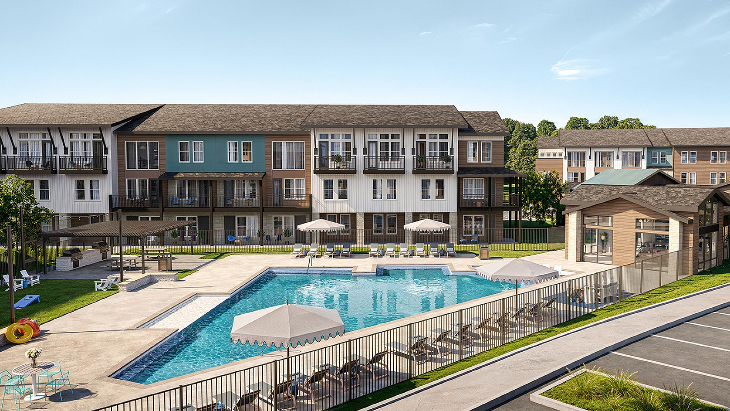 Charming apartment complex featuring modern balconies overlooking a pristine swimming pool with poolside lounging area, perfect for relaxation and outdoor enjoyment.