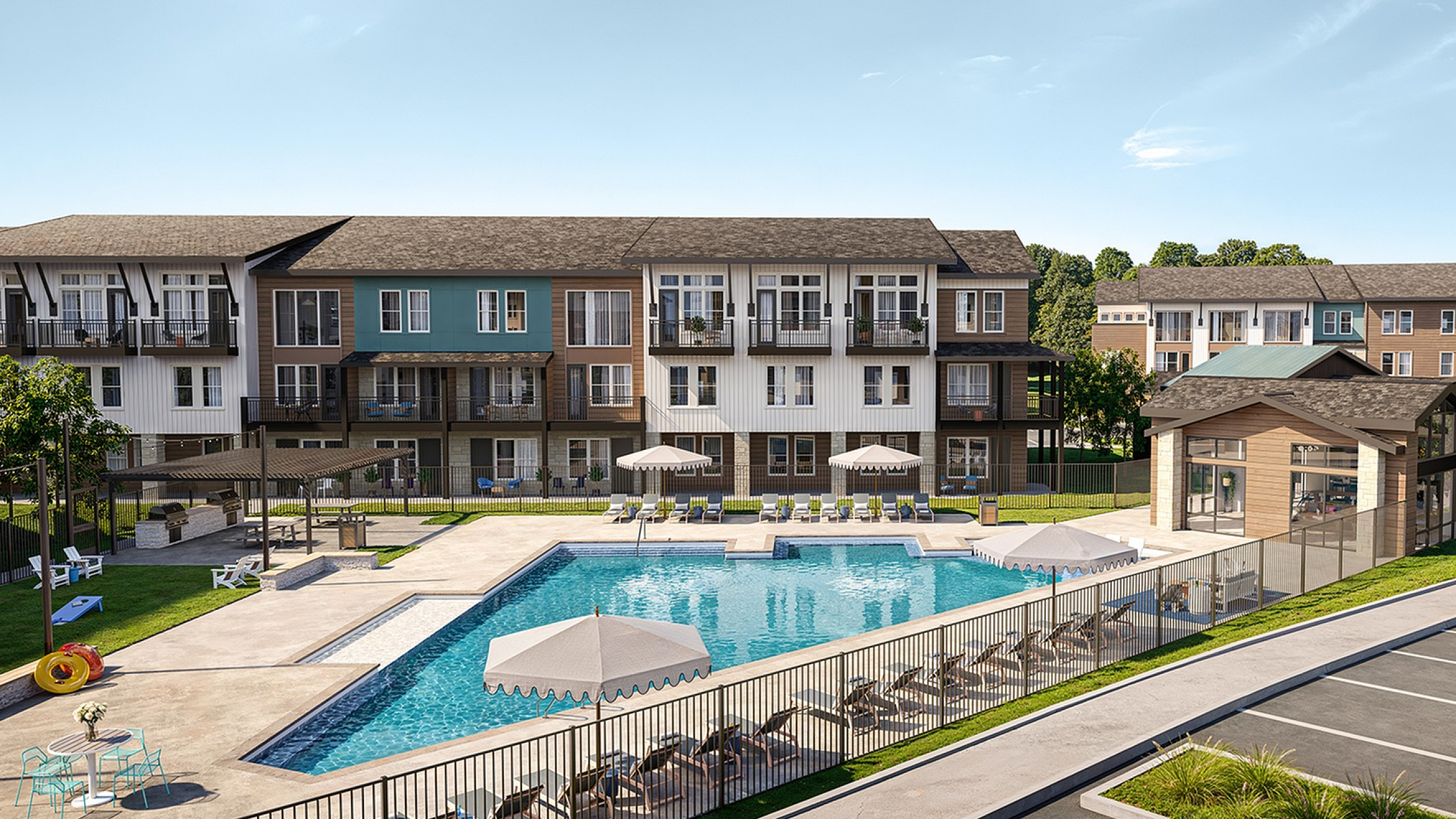 Modern apartment complex featuring a large swimming pool, sun loungers, and stylish architecture with balconies.