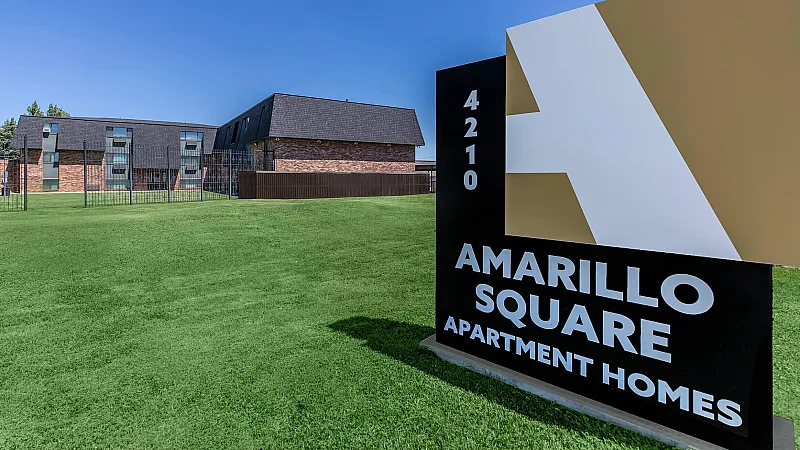 Charming Amarillo Square Apartment Homes with modern architecture and lush green surroundings.