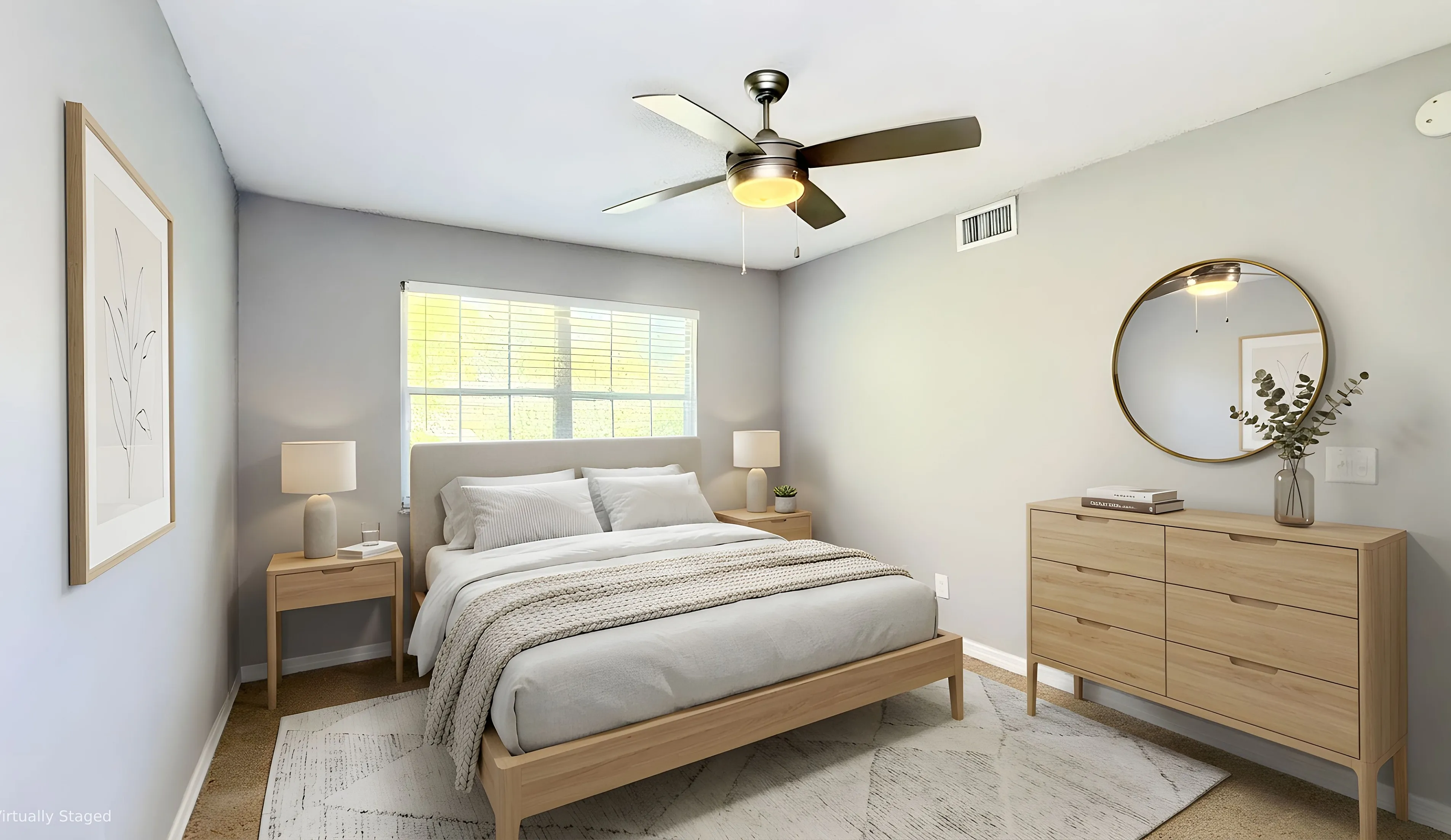 Inviting bedroom with a modern ceiling fan, cozy bed with plush pillows, stylish nightstands, and elegant dresser, exuding tranquility and warmth.