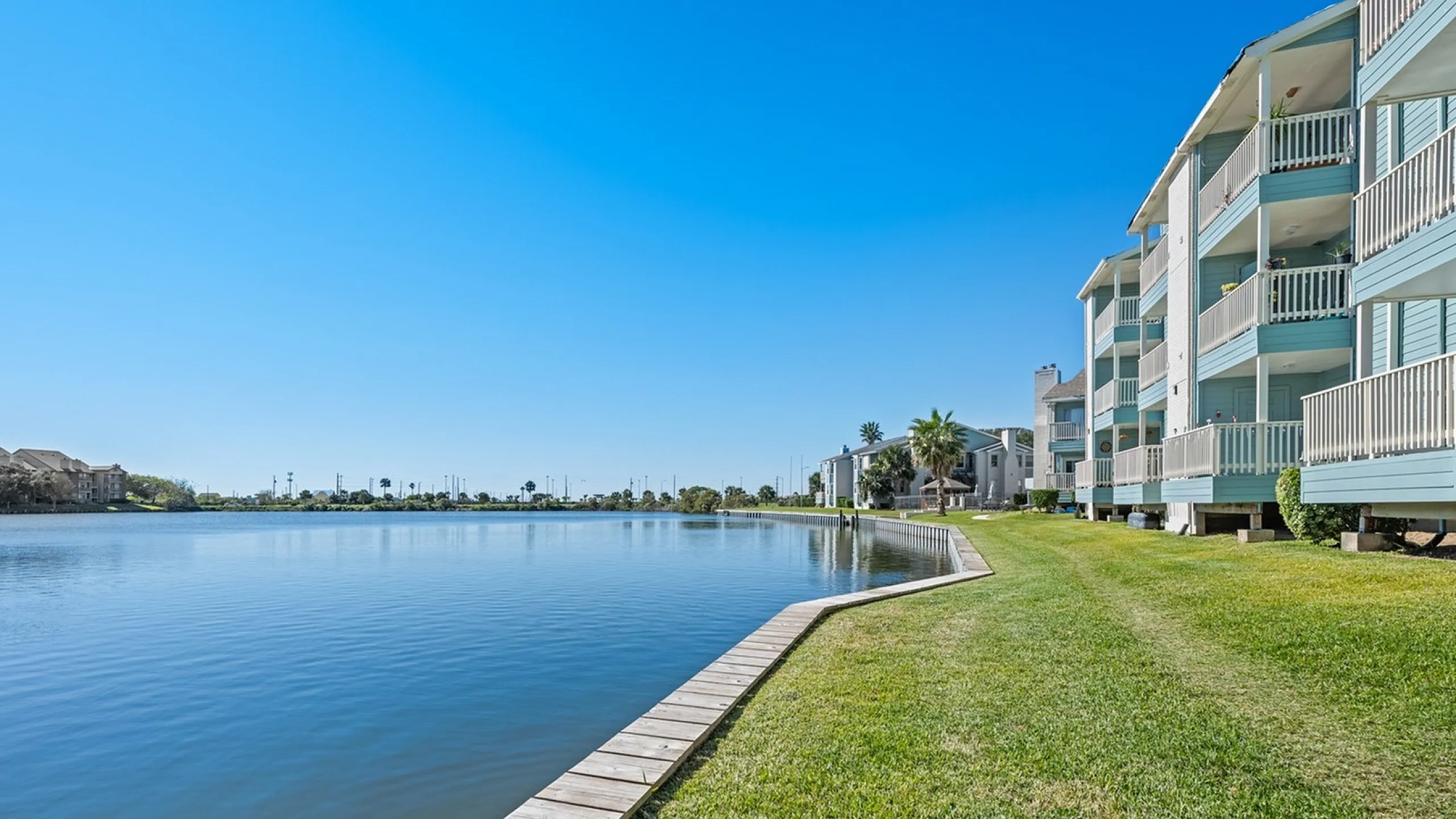 lakeside at campeche lake view from the property calm and beautiful lake with greenbelt walking area