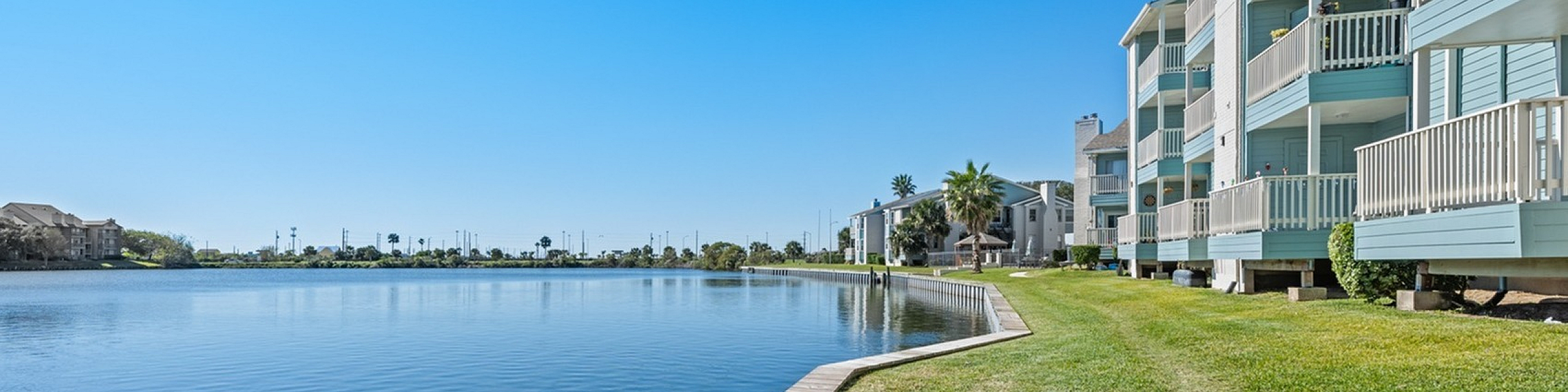 Lakeside at Campeche lake view from property calm waters on aa beautiful sunny day wonderful place to live