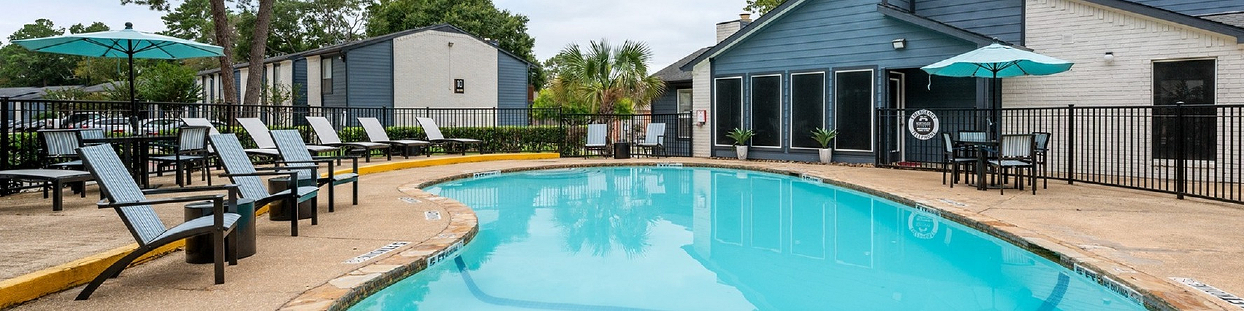 Northside Heights Outdoor amenities resort style pool with loungers