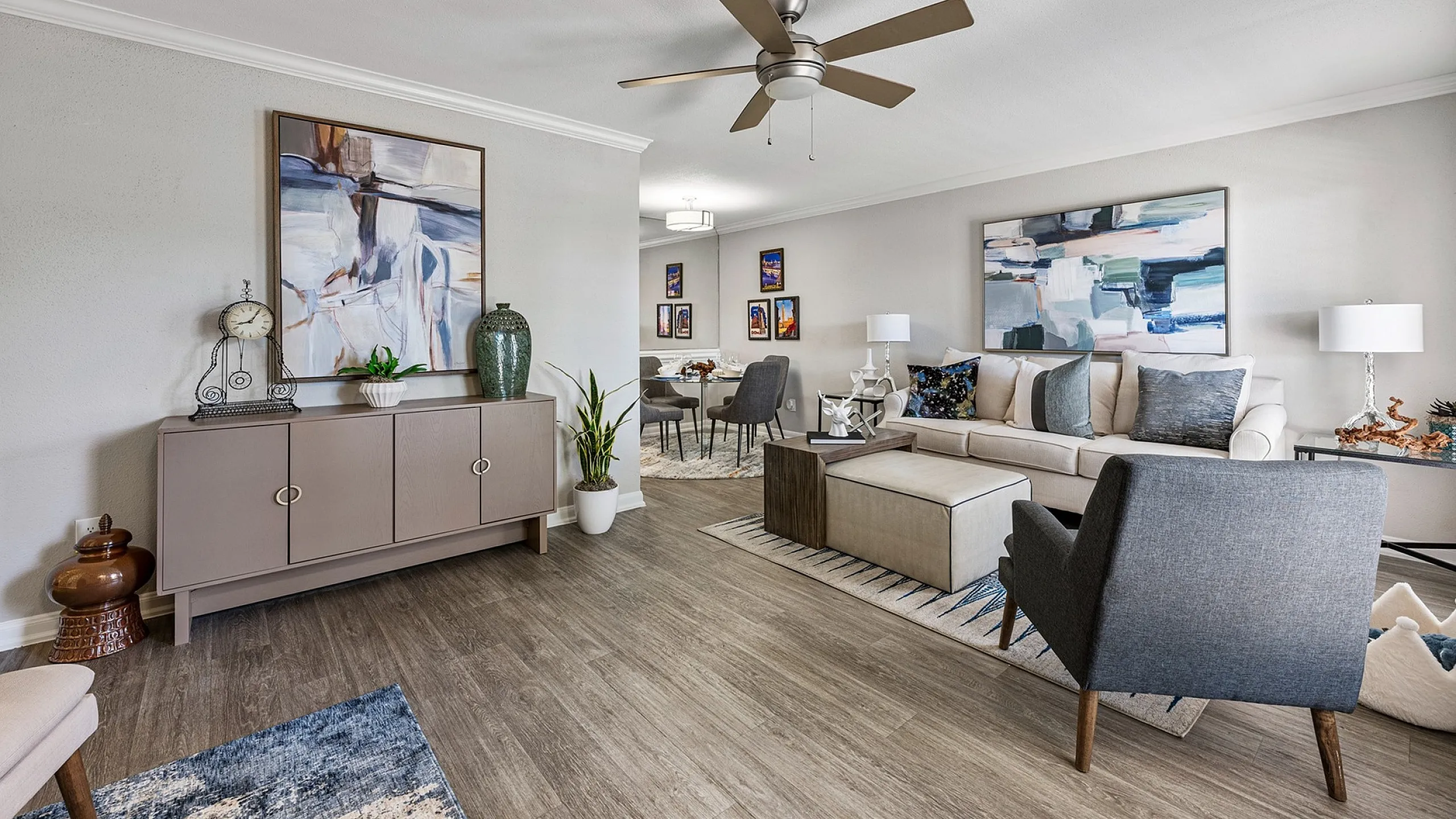 Contemporary living room with stylish furnishings, elegant decor, and warm wooden floors, perfect for comfortable living and entertaining.