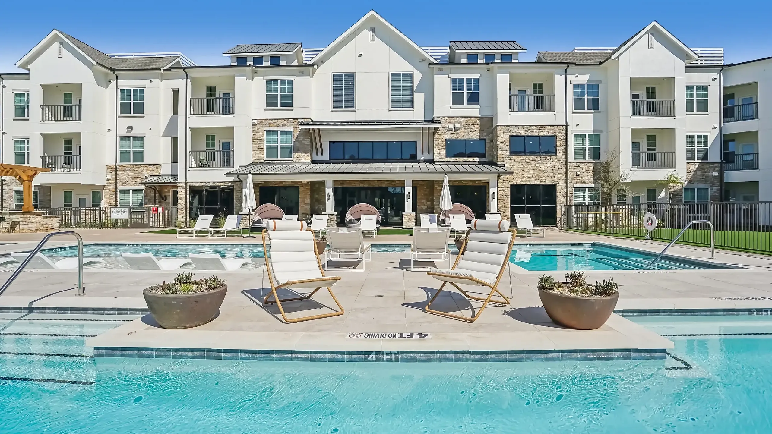 spectacular double pool with ample loungers cabanans and a sun deck to catch the rays