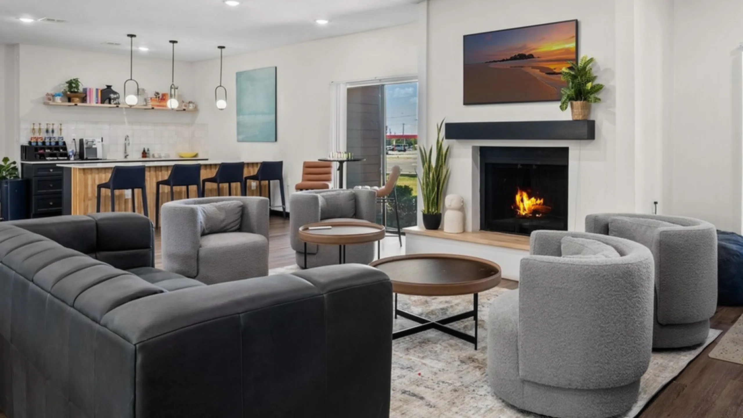 Inviting modern living room with cozy fireplace, elegant seating, and a stylish open-plan layout perfect for entertaining.