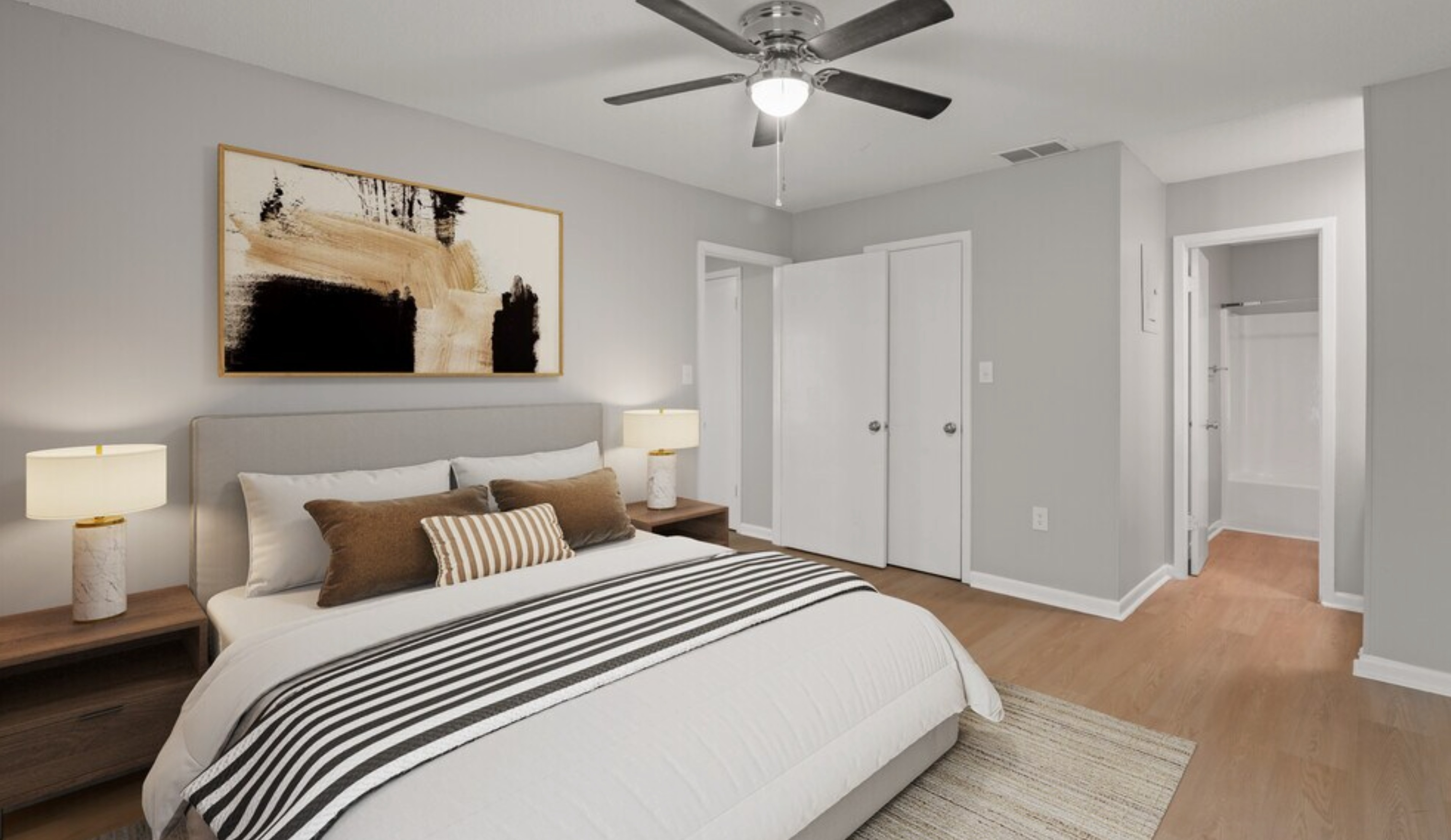 Elegant bedroom with modern decor, featuring a cozy bed, stylish artwork, and ambient lighting for a relaxed atmosphere.